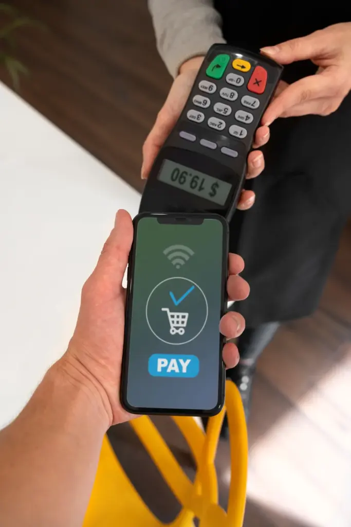 a person using a mobile point of sale system for a purchase.